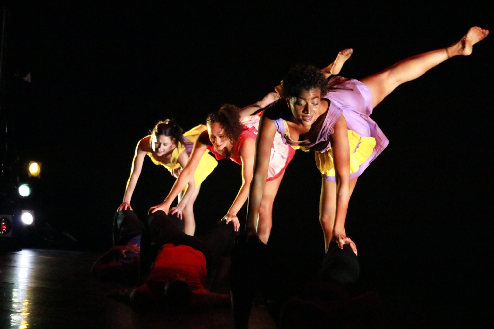 ShadowOfRemembrance2019.jpg 3 ladies from Ballet Creole Dance Company performing the Dark Shadow of Remembrance